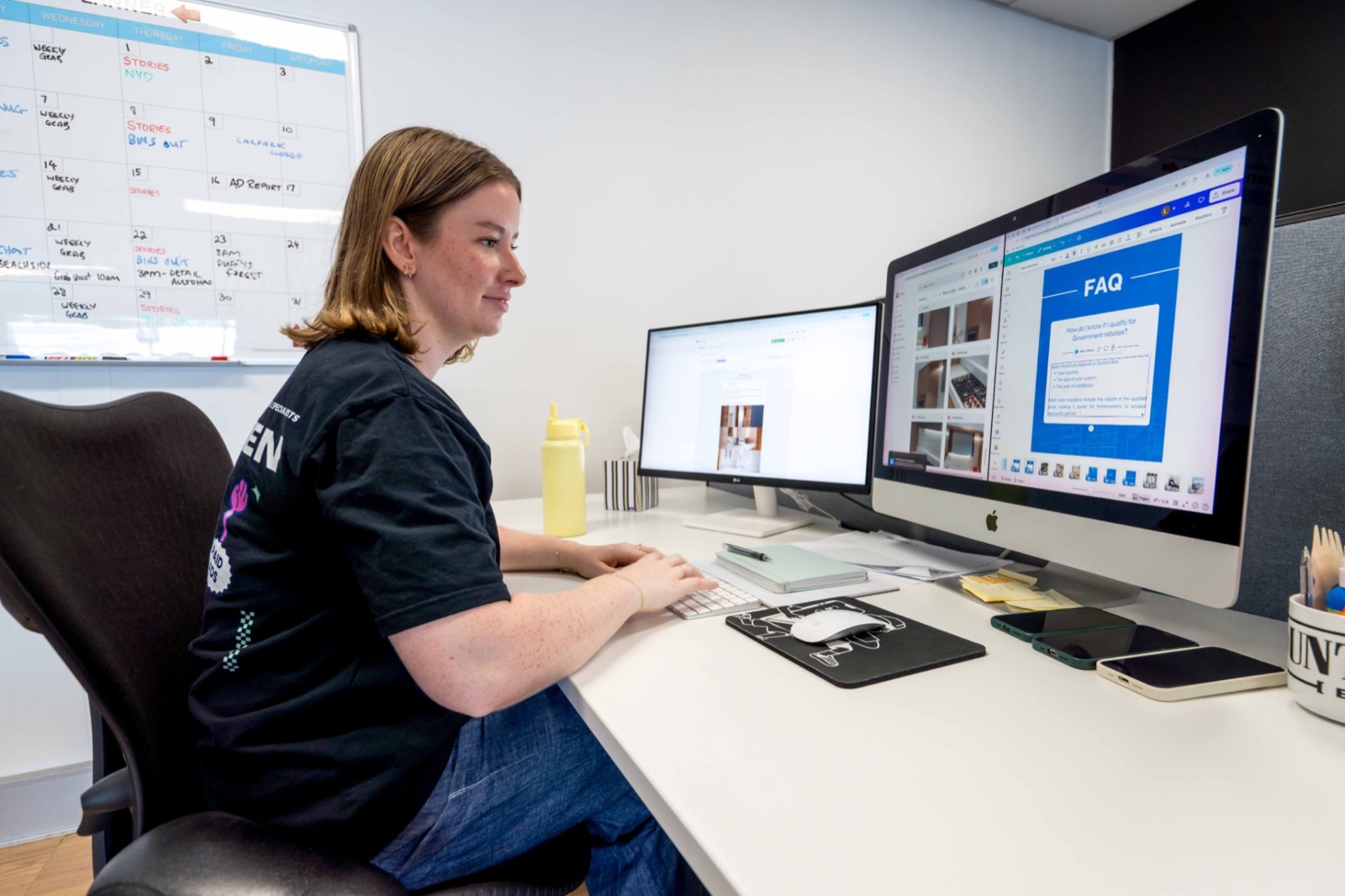 A Grab Social team member creating client content at her desk