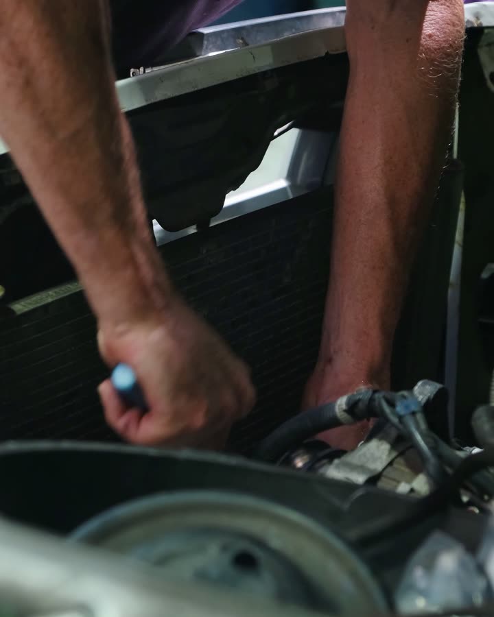 Mechanic working on a car