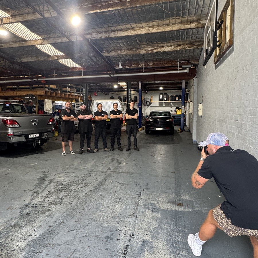 Photographer shooting a workshop crew